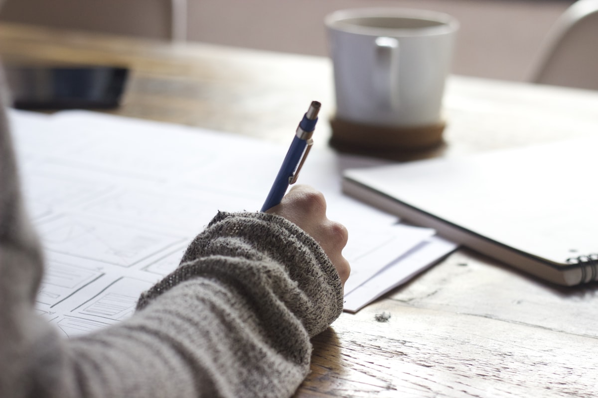Student studying at a desk preparing for exam